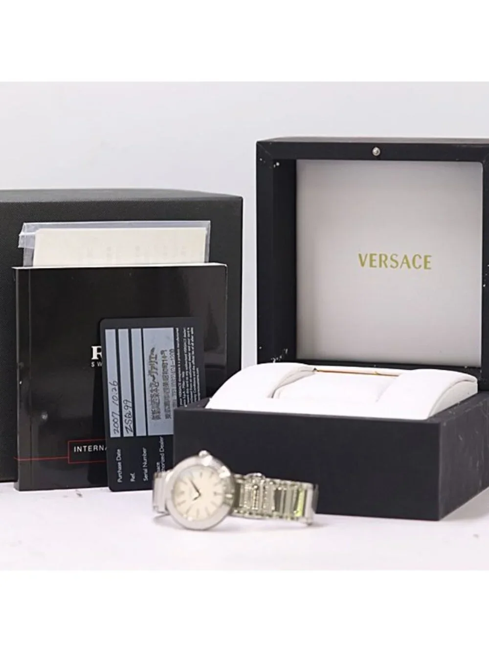 Versace Guaranteed and in Landmark Round Quartz White Dial Watch